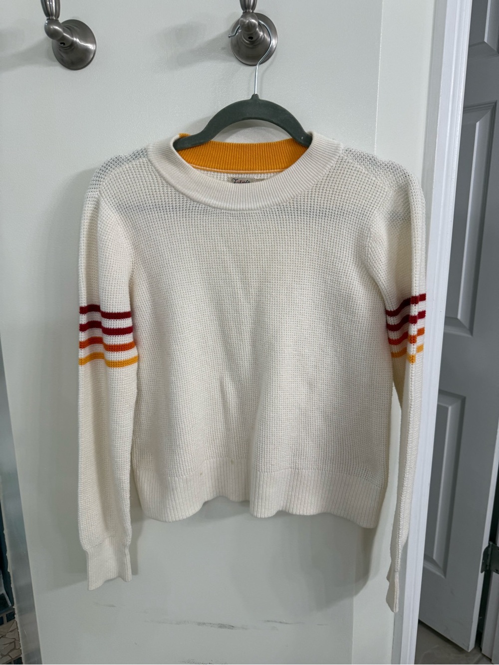 Faherty Cream Crewneck Sweater with Red and Orange Sleeve Stripes